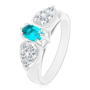 Lesklý prsteň v striebornom odtieni, ligotavá mašlička s modrým oválom - Veľkosť: 57 mm